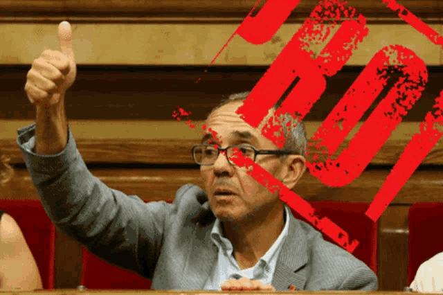 a man giving a thumbs up in front of a stamp that says ' r ' on it