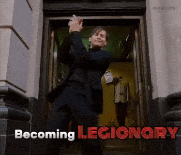 a man in a suit is dancing in a doorway with the words becoming legionary behind him
