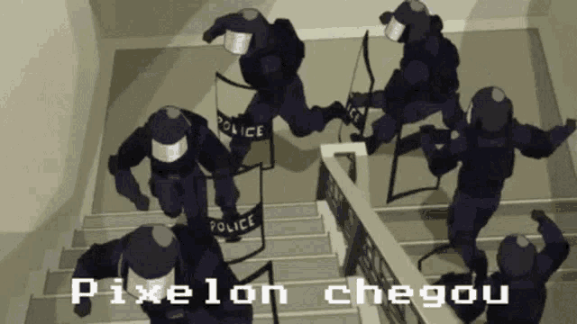 a group of police officers running down stairs
