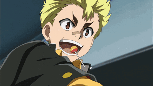 a boy with a lollipop in his mouth looks angry