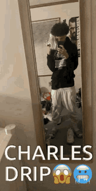 a man taking a picture of himself in a mirror with the words charles drip on the bottom