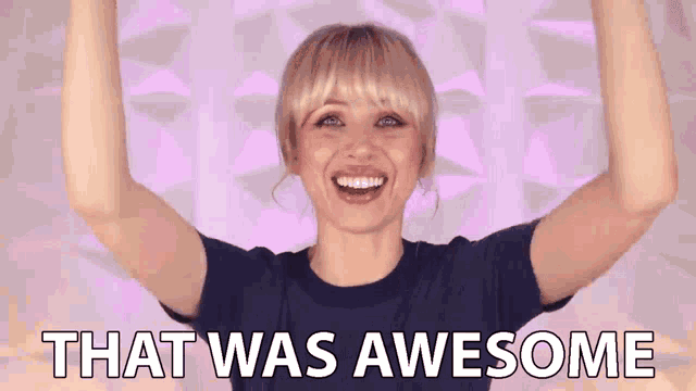a woman is raising her arms in the air with the words that was awesome behind her .