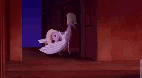 a cartoon horse with wings is standing in a dark room with a chain around its neck .