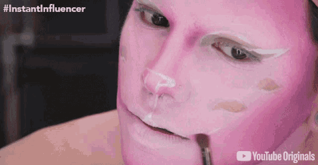 a close up of a person 's face with a youtube originals watermark