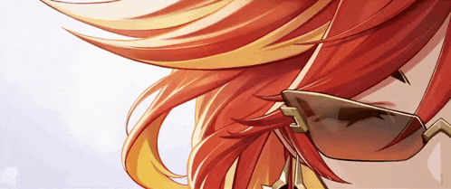 a close up of a person 's hair and sunglasses