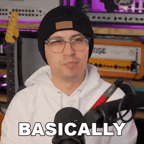 a man with glasses and a beanie says basically
