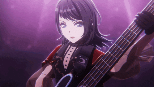 a girl is holding a bass guitar with a strap that says ' tokyo ghoul '