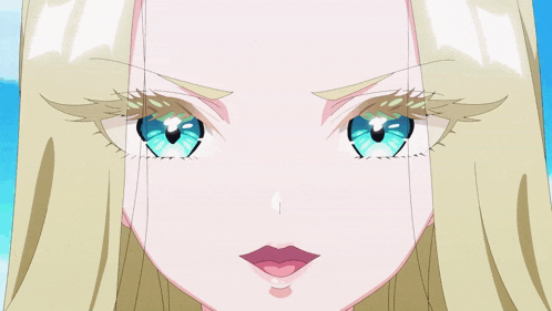 a close up of a girl 's face with blonde hair and blue eyes