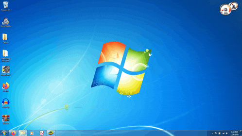 a computer screen shows the windows logo and a few other icons
