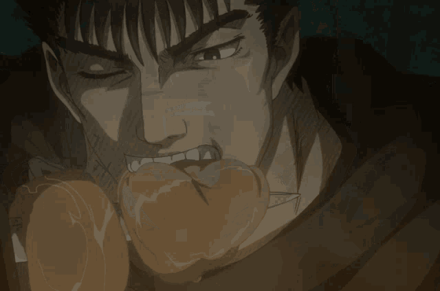 a close up of a man holding a piece of meat
