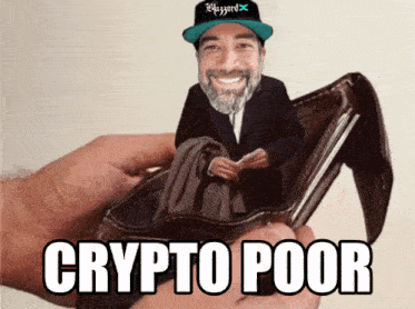 a man with a beard is holding an empty wallet with the words " crypto poor " on it