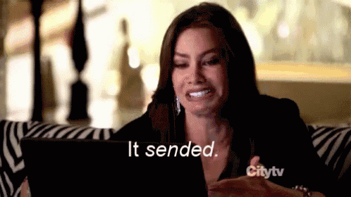 a woman is sitting on a couch looking at a tablet and says it 's sented .