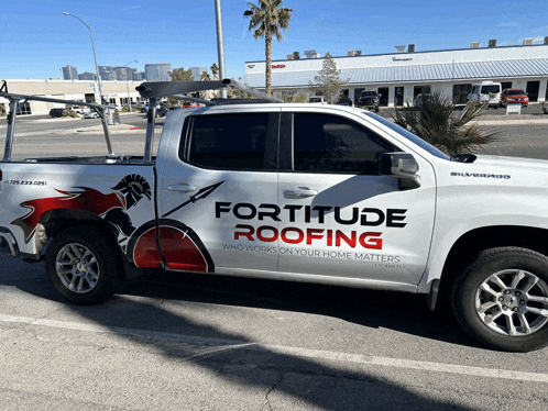 a white truck that says fortitude roofing on the side