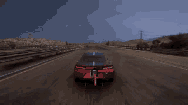 a red car with the number 5 on the back