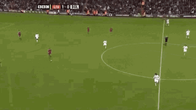 a soccer game is being played in front of a barclay 's ad