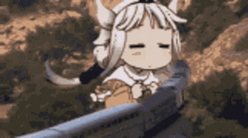 a cartoon girl with horns is sitting on a train .