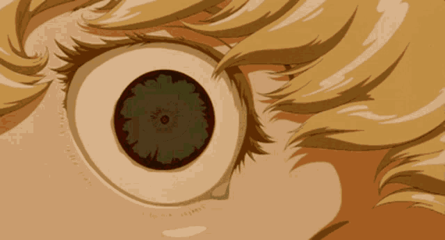 a close up of a cartoon character 's eye with a very large pupil