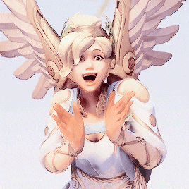 a woman with wings and a crown on her head is smiling
