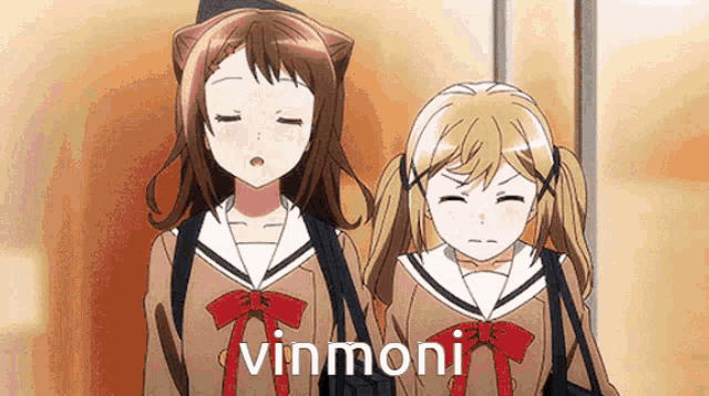 two anime girls are standing next to each other and the word vinmoni is on the bottom right