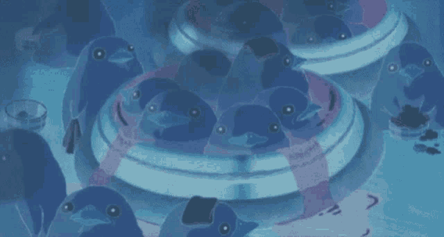 a bunch of birds are sitting on top of a circular object