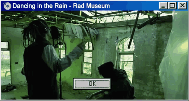 a computer screen displays a video called dancing in the rain