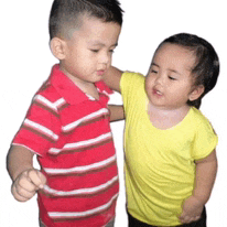 a boy in a red striped shirt and a girl in a yellow shirt are hugging each other