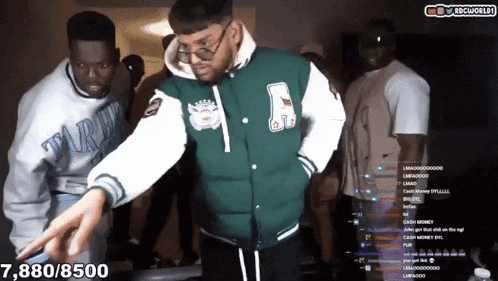 a man in a varsity jacket with the letter a on it is dancing