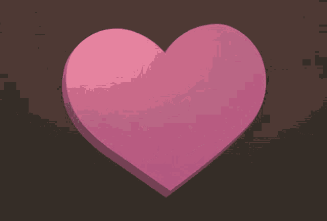 a pink heart is on a brown background next to a white paw