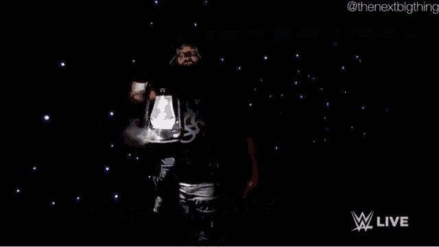 a man with a beard is holding a lantern with the name sam wyatt written in white letters