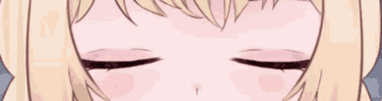 a close up of a girl 's eyes with pink and yellow irises and a yellow pupil .