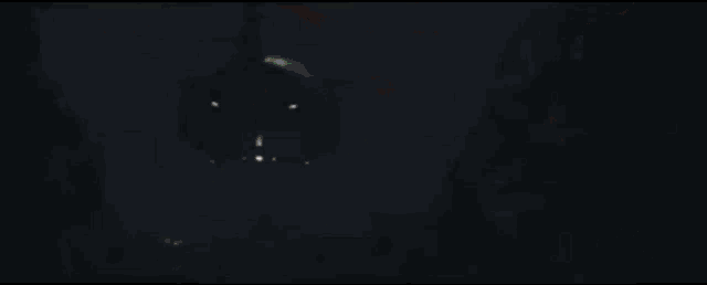 green and red letters that say king kong on a black background