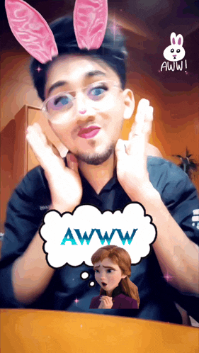 a man with bunny ears and a speech bubble that says awww on it