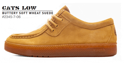 a pair of cats low buttery soft wheat suede shoes with a brown sole