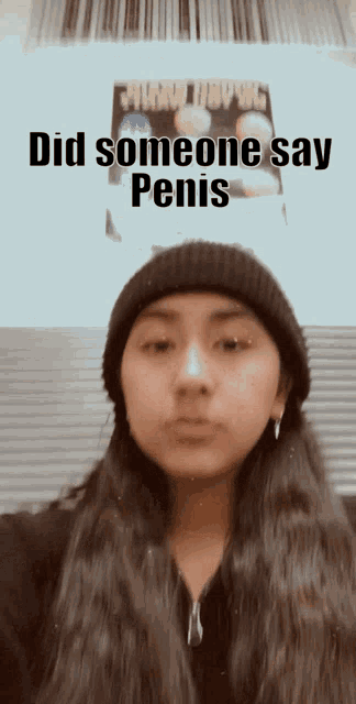 a girl wearing a black beanie has the words did someone say penis above her