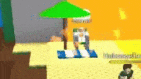 a person is laying on a towel under an umbrella on the beach in a video game .