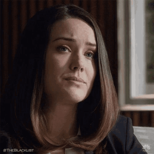 a close up of a woman 's face with the hashtag #theblacklist on the bottom