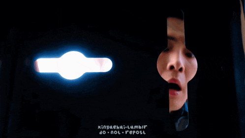 a person 's face is visible through a hole in a door with the words " do not repost " on the bottom