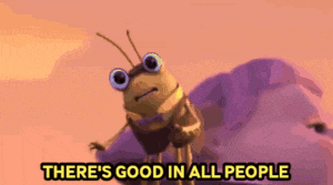 a cartoon bug is standing on top of a mountain and says there 's good in all people .
