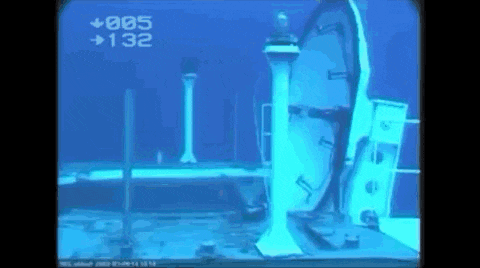 a video of a ship in the ocean with the numbers 005 and 132