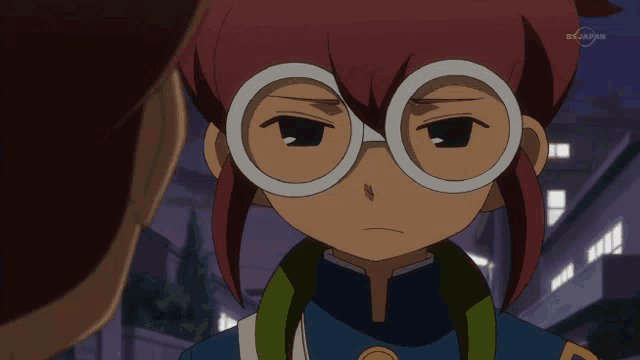 a cartoon character with glasses and the word japan on the bottom left