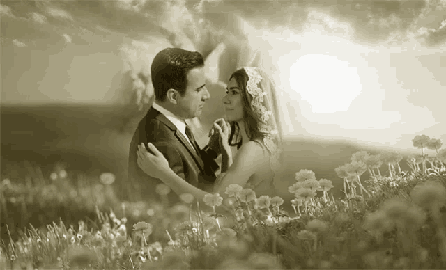 a black and white photo of a bride and groom