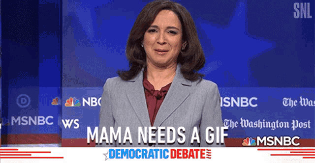 a woman stands in front of a screen that says ' mama needs a gif '