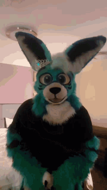 a person in a blue and white furry costume