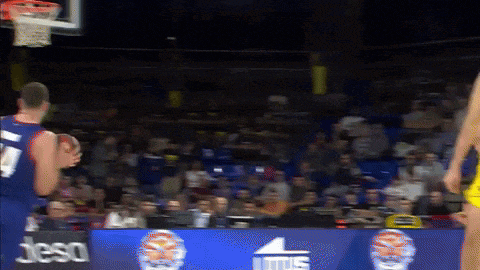 a basketball player in a blue jersey with the number 4 on it