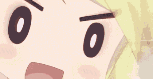 a close up of a cartoon character 's face with a surprised expression .