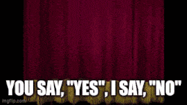 a red curtain with the words " you say yes i say no " on it