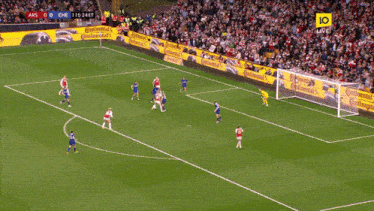 a soccer game is being played in front of a crowd with continental advertisements on the sidelines