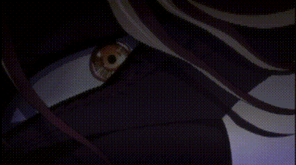 a close up of a person 's eye in a dark room with a purple background .