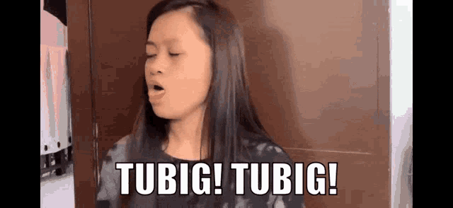 a woman with her eyes closed is making a funny face with the words tubig tubig written above her