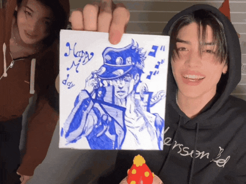 a person holding up a piece of paper that says happy